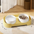 Green ceramic raised cat bowl set with two bowls on a 15° tilted stand and non-slip base.