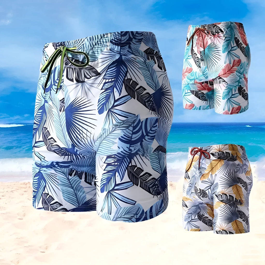 Men's cropped beach swimming trunks in multicolour leaf pattern with briefs style