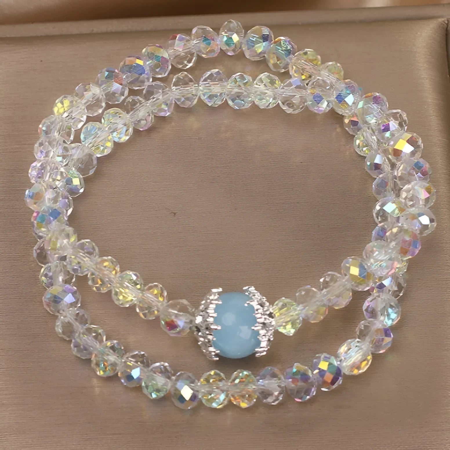 White crystal double ring bracelet for women with electroplated finish on light background