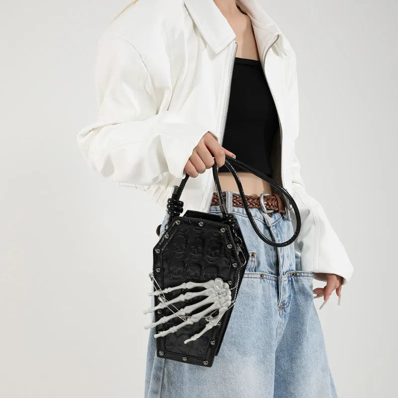 Square vertical one-shoulder handbag with single strap, embossed detail, and phone pocket