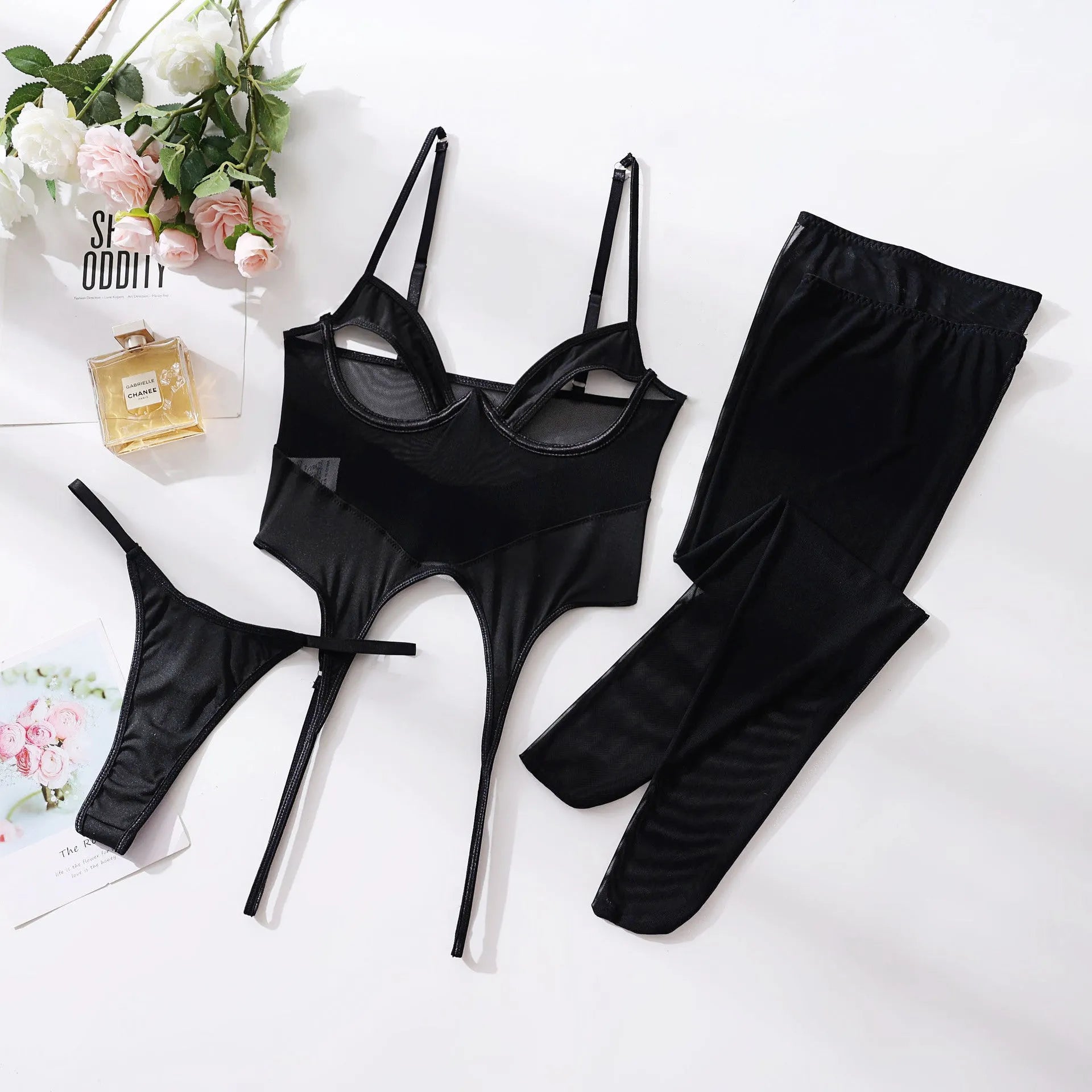 Black one-piece women's stockings with steel ring mesh see-through panels.