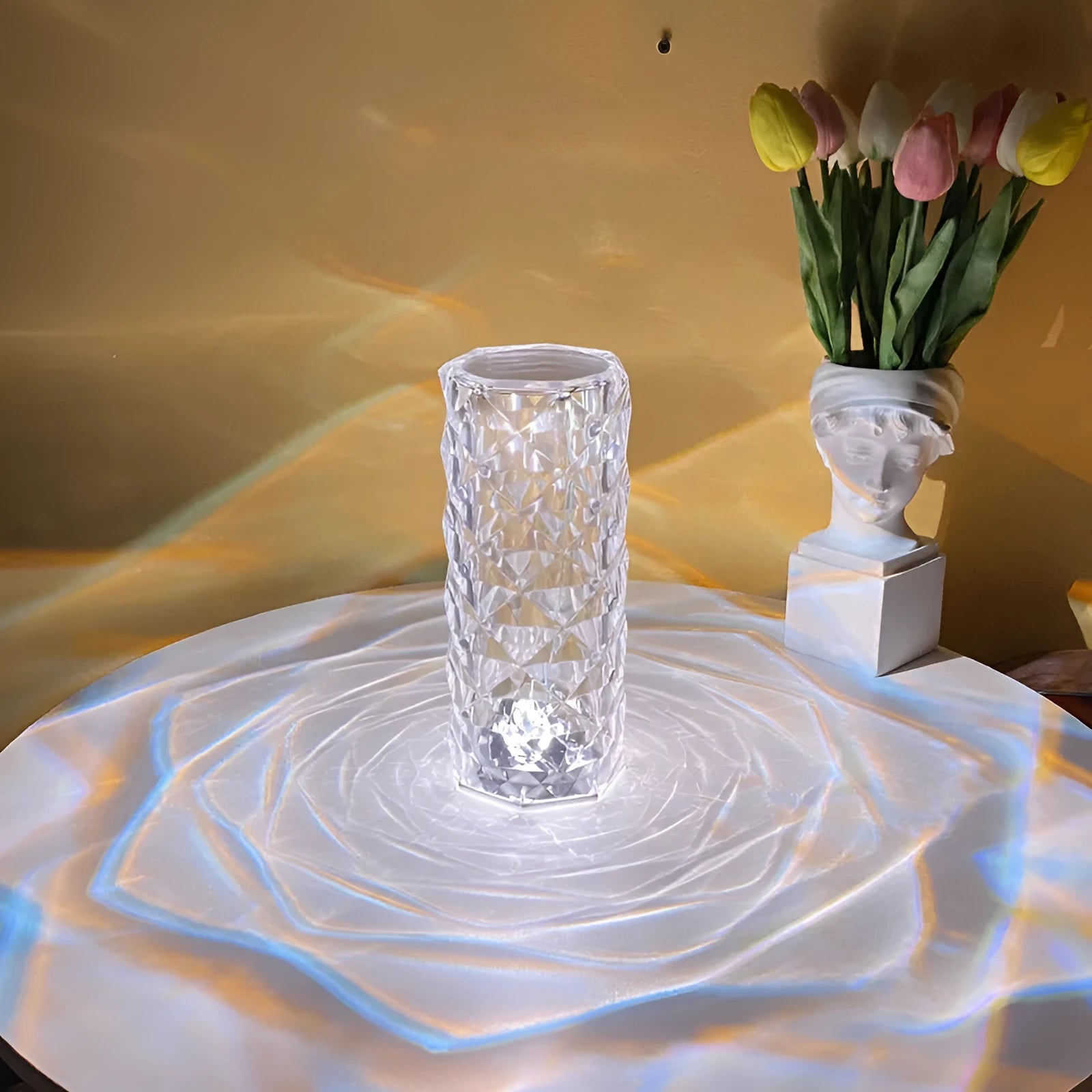 Romantic LED rose diamond table lamp with crystal-like PAMA acrylic construction on a table