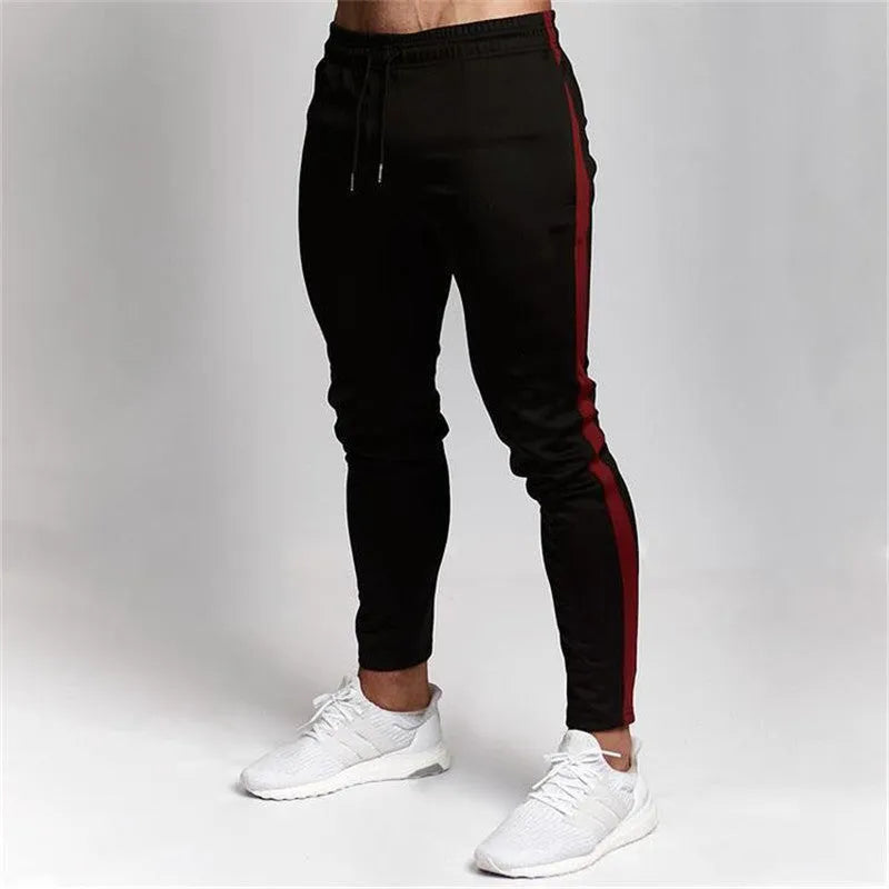 Sports cropped pants in polyester fibre, available in Khaki colour, showing cropped leg length and elastic waistband