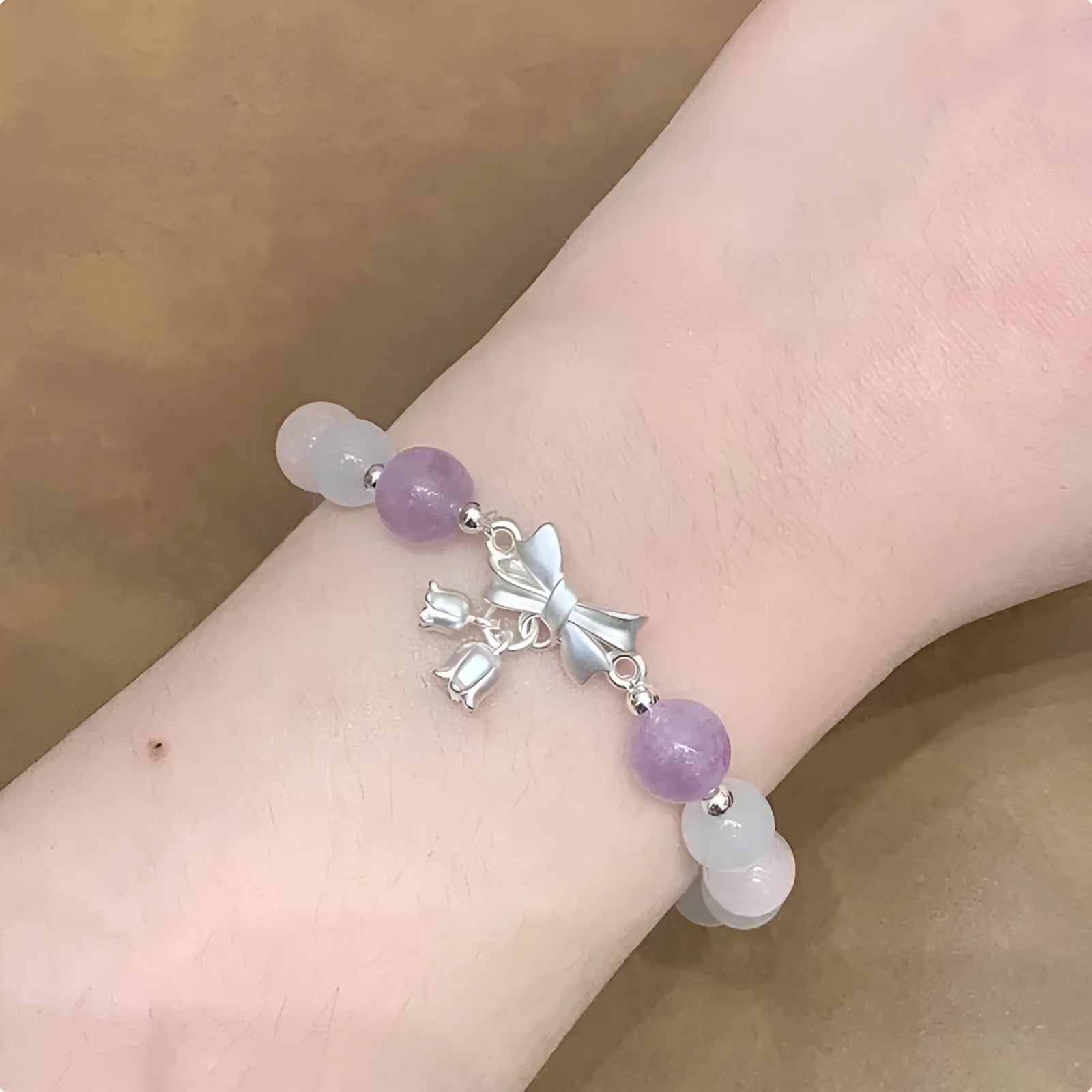 Lavender purple crystal bracelet with bowknot design measuring 10mm for women's fashion.