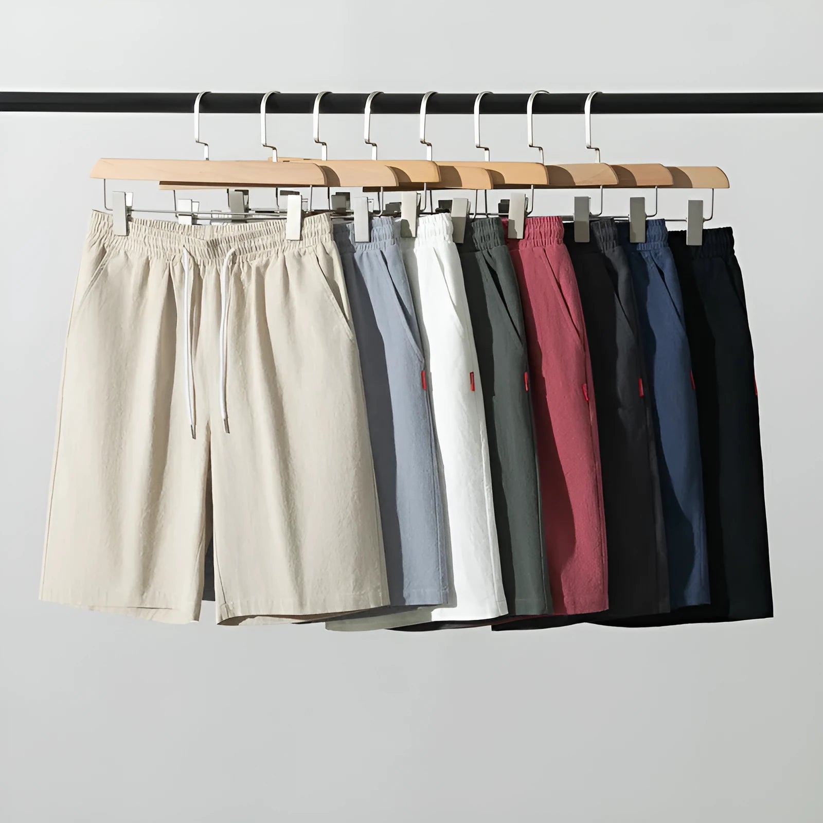 Chinese style solid colour cropped summer pants on a hanger.