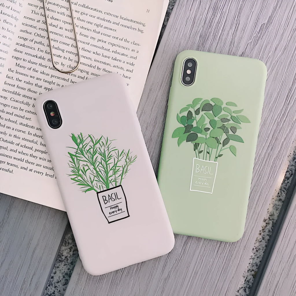 White silicone iPhone case with a detailed painted plant pattern on the back.