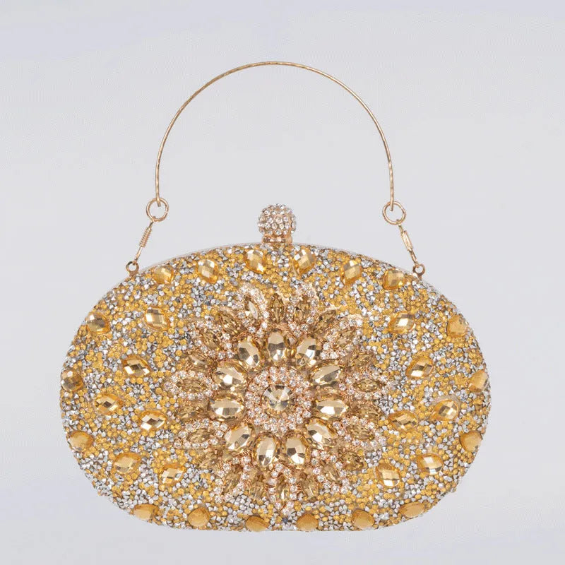 Gold hardware and rhinestone banquet handbag with structured retro design measuring 20cm wide