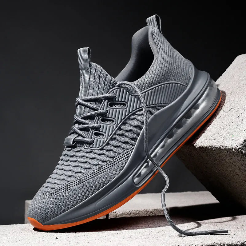 Men's low-top mesh running shoes in black with rubber sole and round toe design