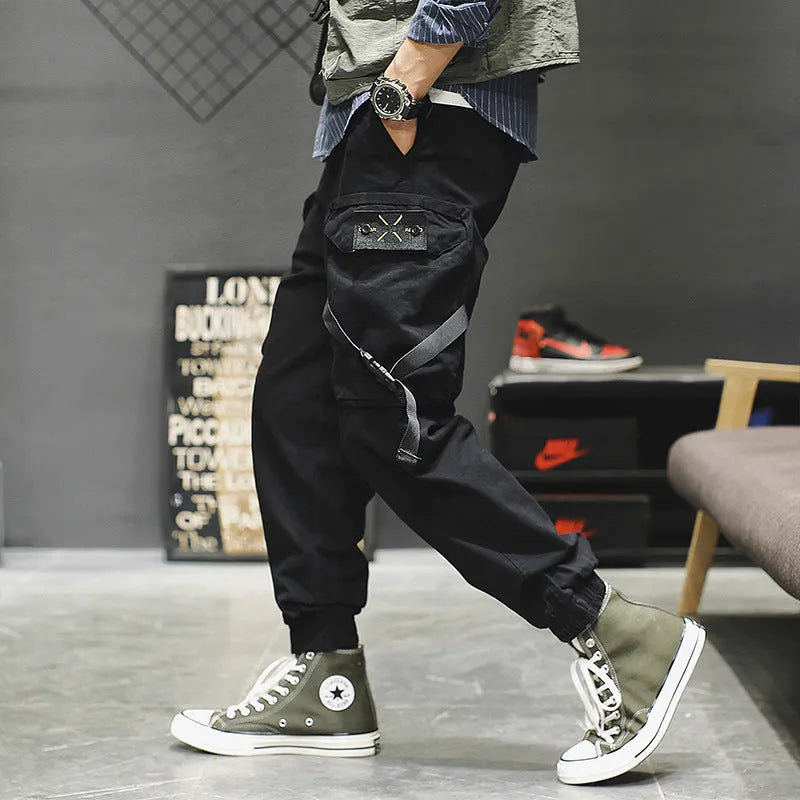 Men's cotton cargo pants in Khaki with multiple pockets, side view