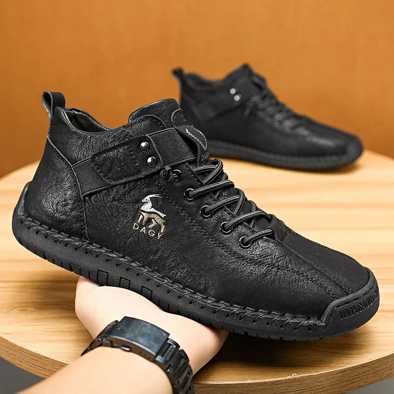 Men's casual sneakers in black with microfiber upper, rubber sole, lace-up front, and car stitching detail