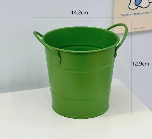 Round metal desktop pen holder storage box in a choice of colours including pink, green, red, white, and yellow.