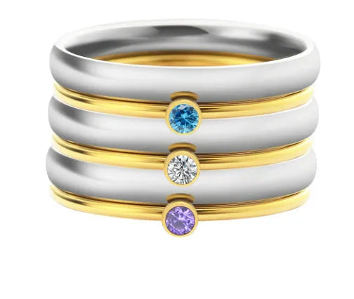 Geometric engraved titanium steel ring with a December birthstone colour overlay and gold electroplated finish.