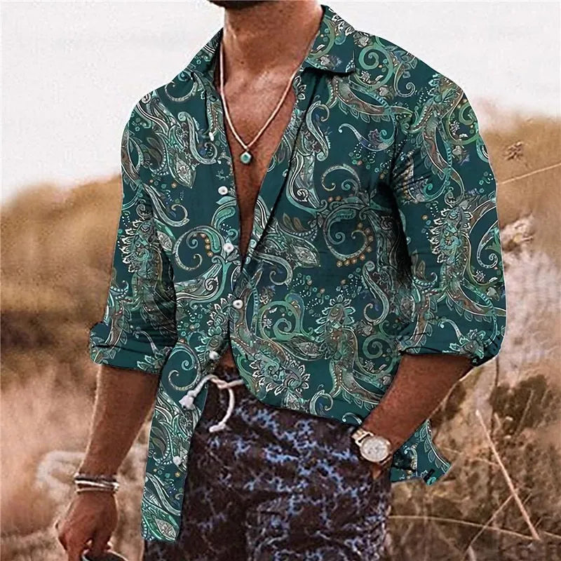 Man wearing a loose-fit bohemian shirt with a colourful 3D floral print pattern, long sleeves.