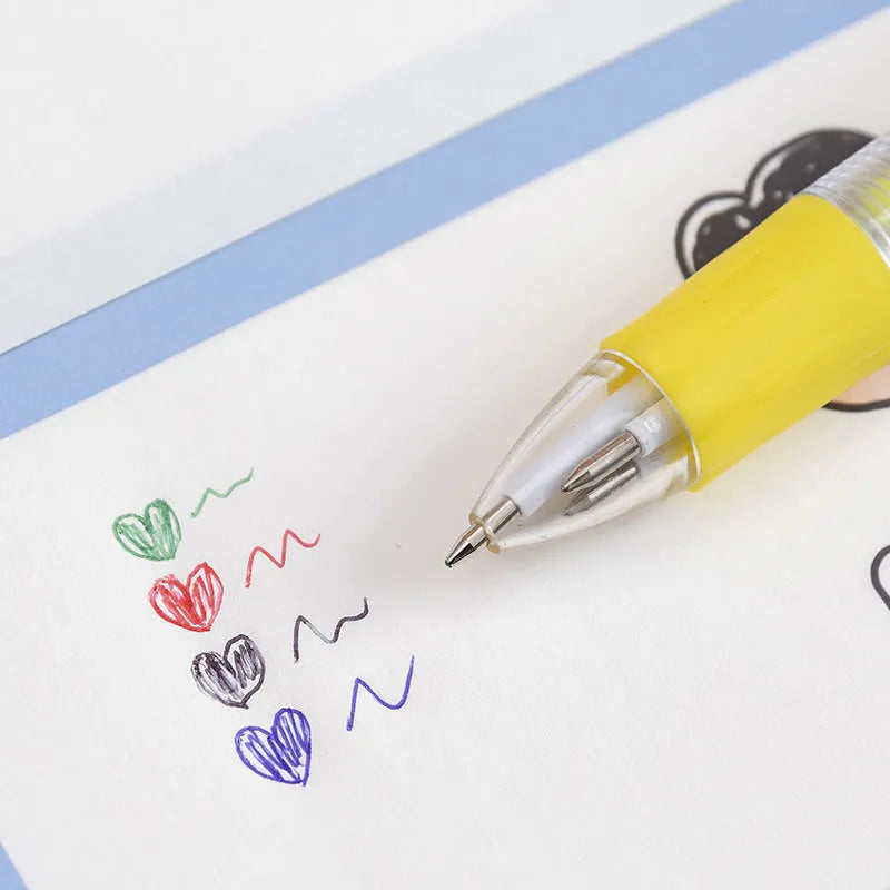 A four-colour ballpoint pen with a press top and a cute cartoon design on a silicone grip section.