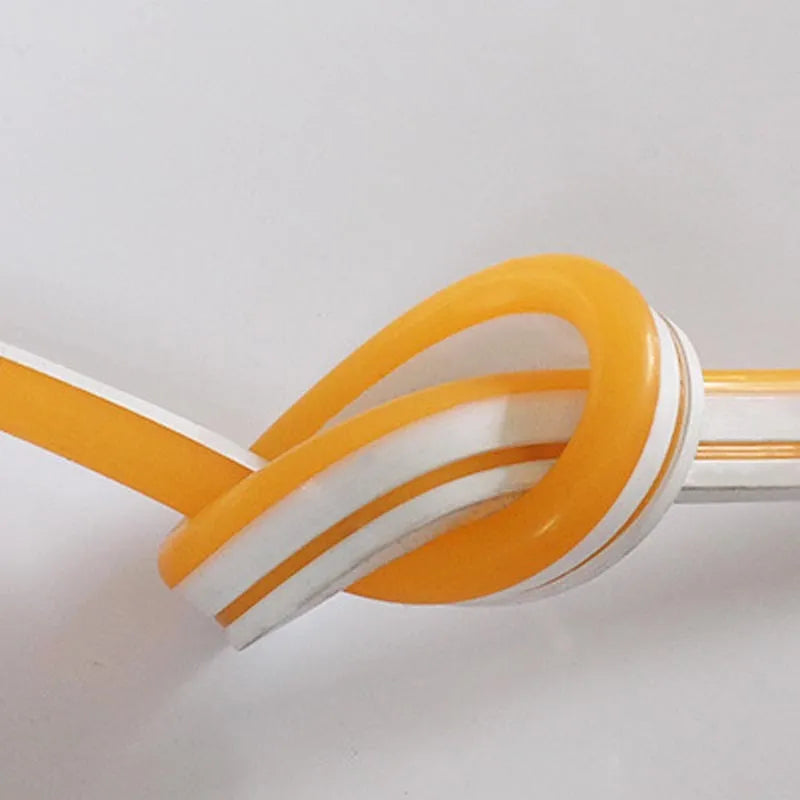 Close-up of flexible blue silicone neon LED strip lighting showing dense LED beads.