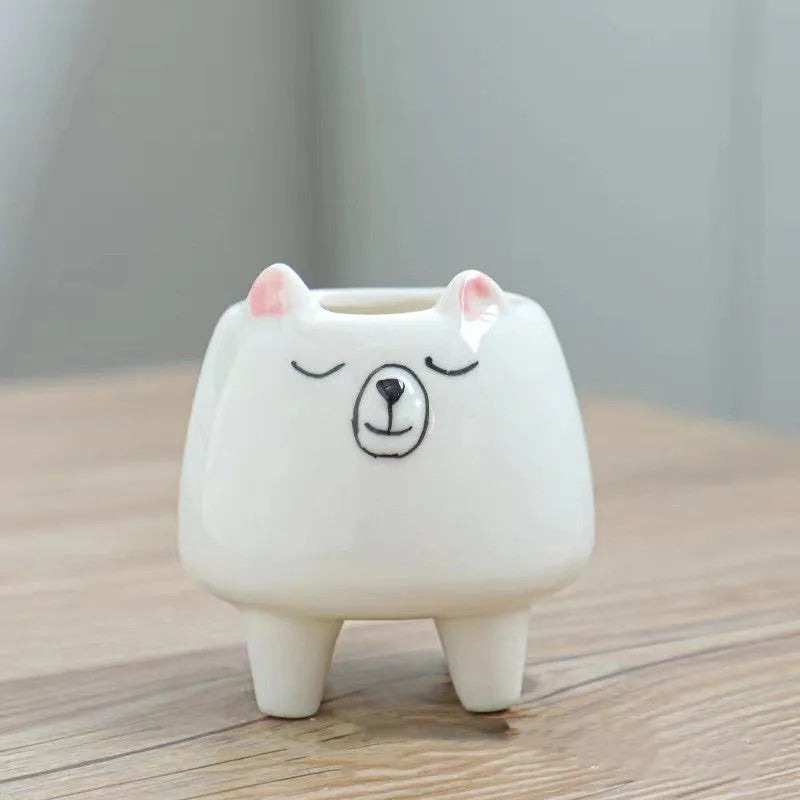 Ceramic succulent flowerpot with hand-painted cartoon animal design in pastel colours