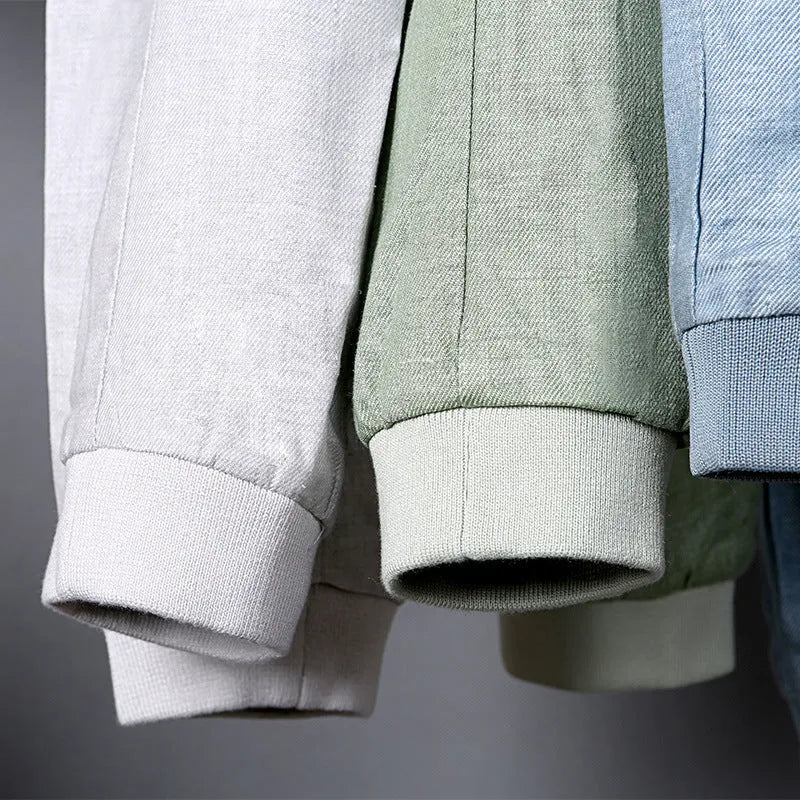 Men's thin blue linen casual jacket with a regular fit on a hanger.