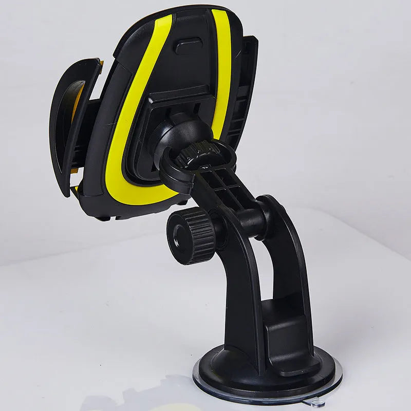 Red U-shaped suction cup car phone holder with wide clamp open, mounted on a car dashboard.