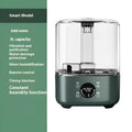 Green large capacity intelligent humidifier with touch screen and remote control on table.