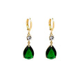 A pair of green geometric teardrop-shaped alloy fashion earrings on a plain background.