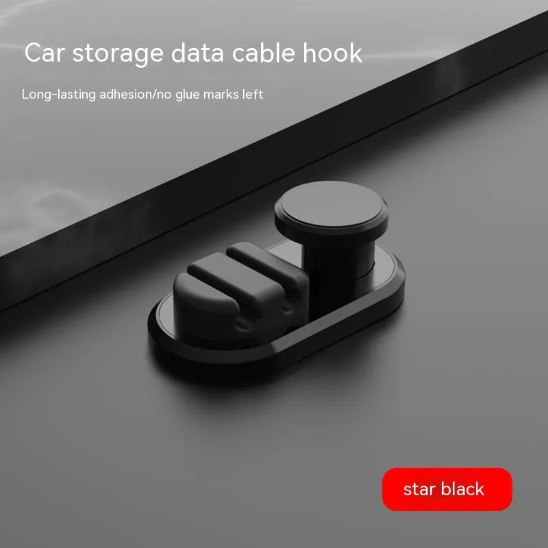 Car data cable storage hook in dark green with adhesive mount for vehicle organisation