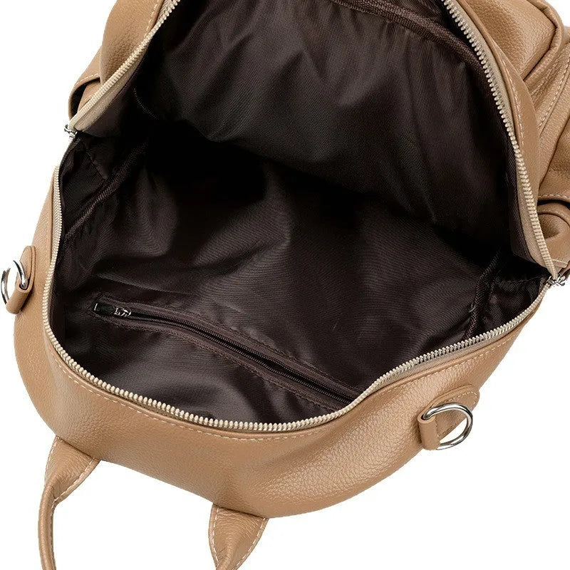 Genuine leather tassel backpack in khaki with fringe, stitching, anti-theft zippered hidden pocket and phone pocket