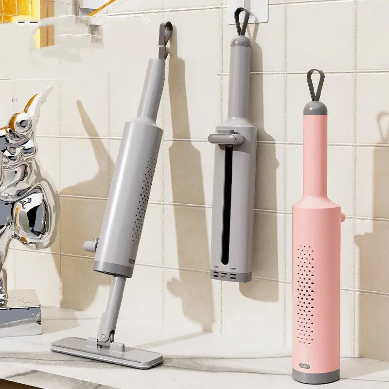 Pink rotatable self-squeeze mini flat mop with microfiber pad and sliding rod mechanism
