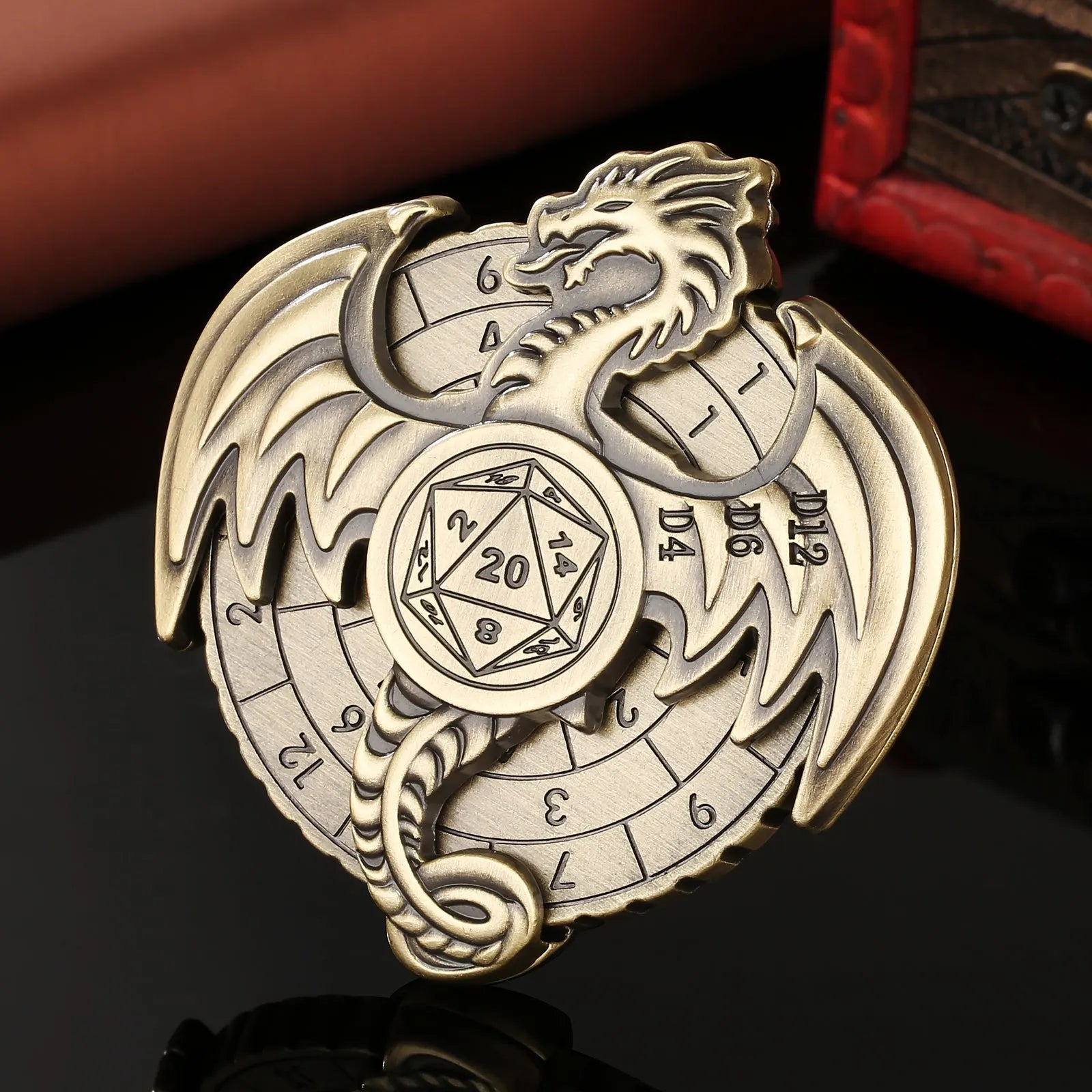 Retro metal fantasy style wings dice wheel with mechanical rotation in bronze finish