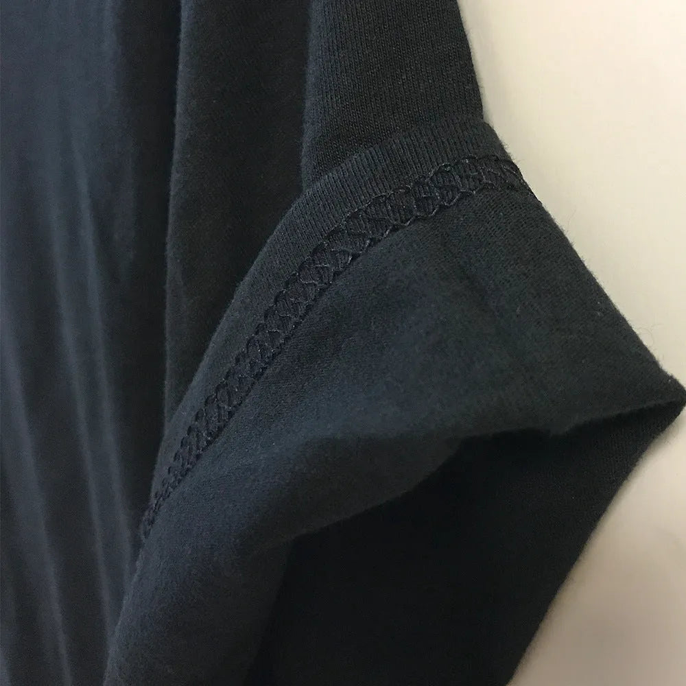 Men's loose fit cotton t-shirt in white and black variants with short sleeves and pullover style