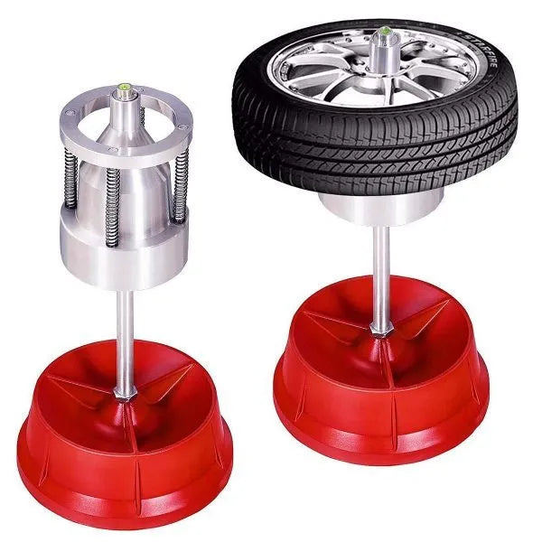 Portable aluminium hub balancer with bull's eye level on an enamel-finished base for tyre balancing.