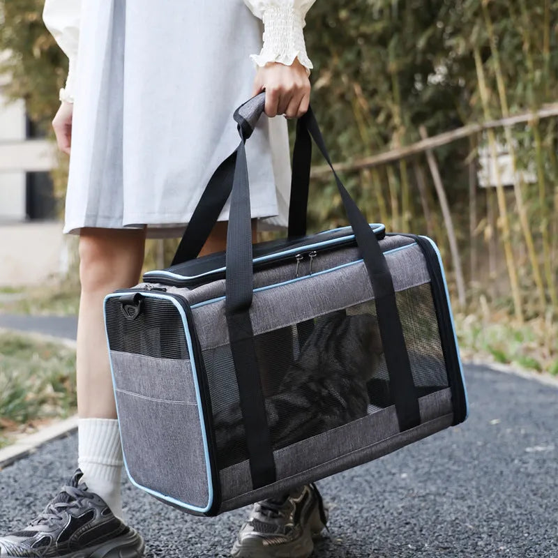 Portable pet carrier bag for dogs and cats with Oxford fabric construction