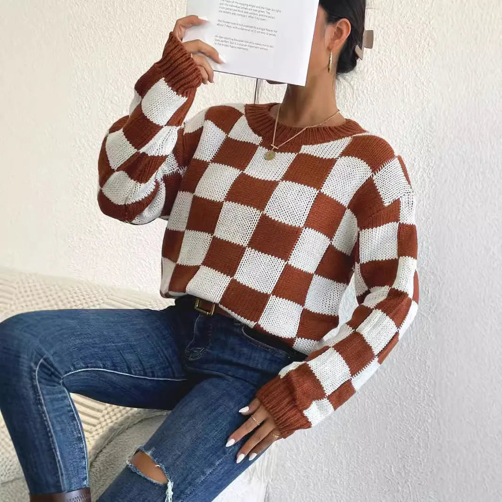 Dark brown plaid pattern acrylic pullover sweater with long sleeves and a loose round neck.