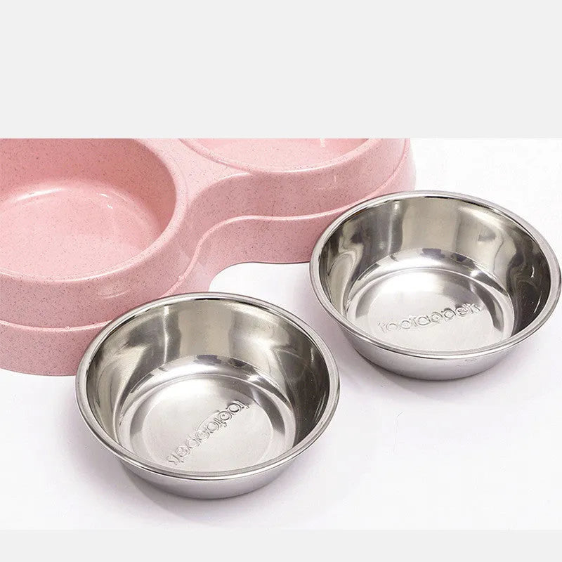 Round two-in-one dog bowl with straw in blue, green, and pink colours measuring 24.5 x 13.5 x 4.6 cm