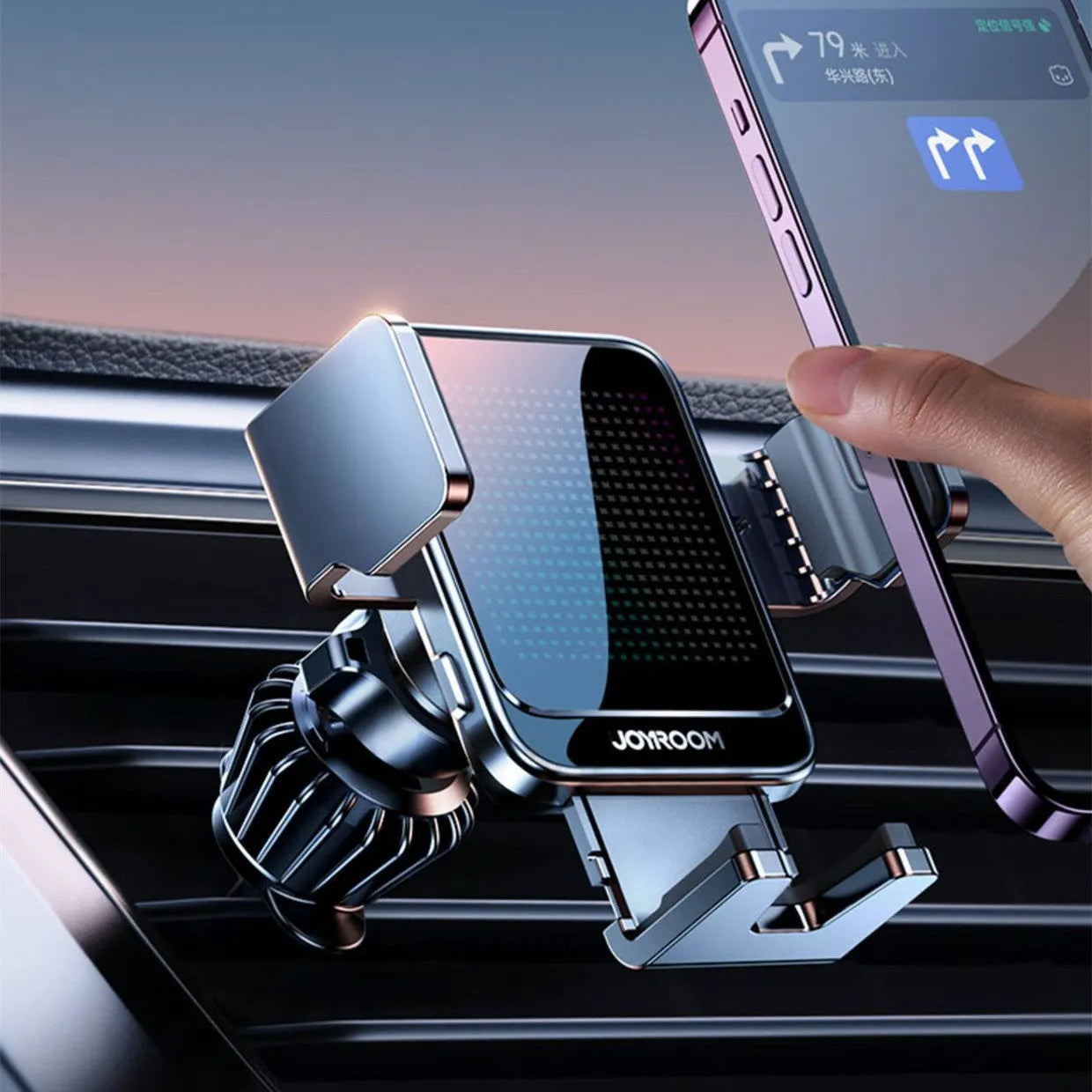 Black car wireless charging phone mount attached to vehicle air vent with phone inserted