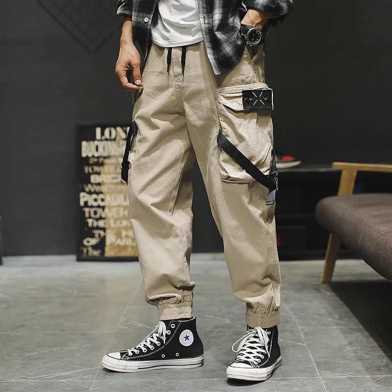 Men's cotton cargo pants in Khaki with multiple pockets, side view