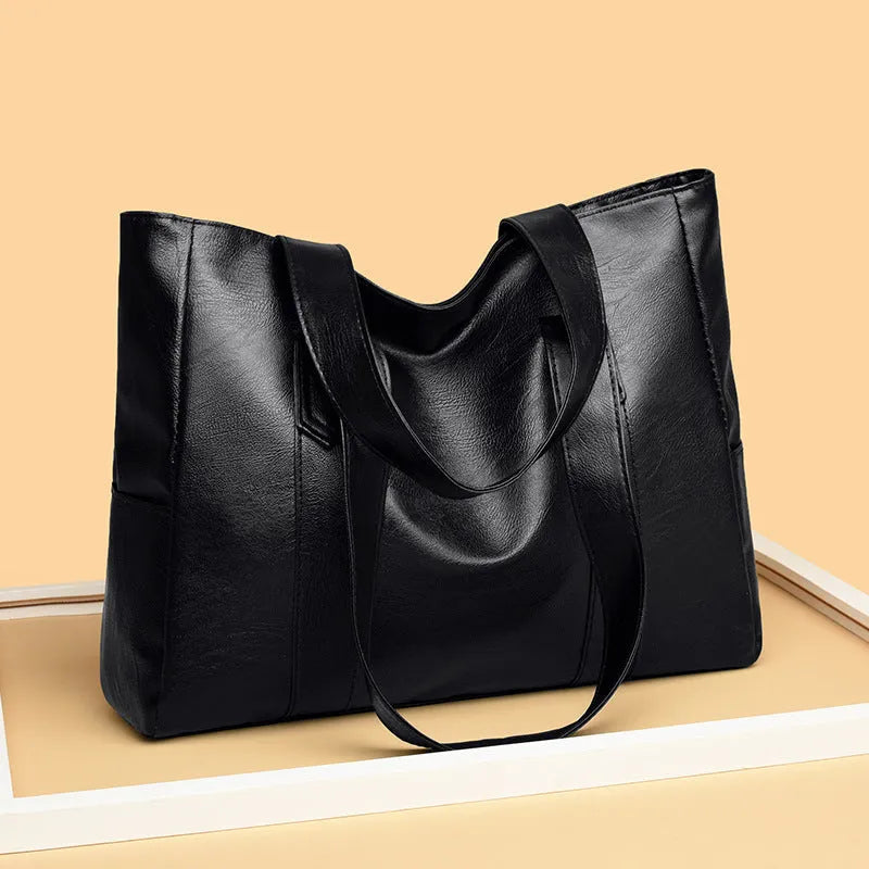 Medium-hard PU leather tote handbag in horizontal square shape with sewing thread detail and double shoulder strap