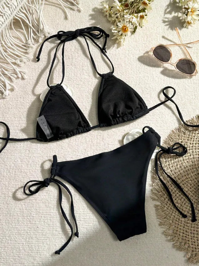 Black two-piece bikini with 3D flower lace detail and a split backless briefs design.