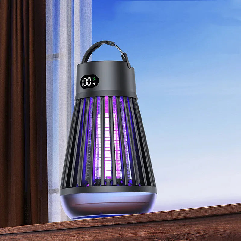 Digital display mosquito killer lamp with electric shock grid, white colour, on a tabletop with USB cable
