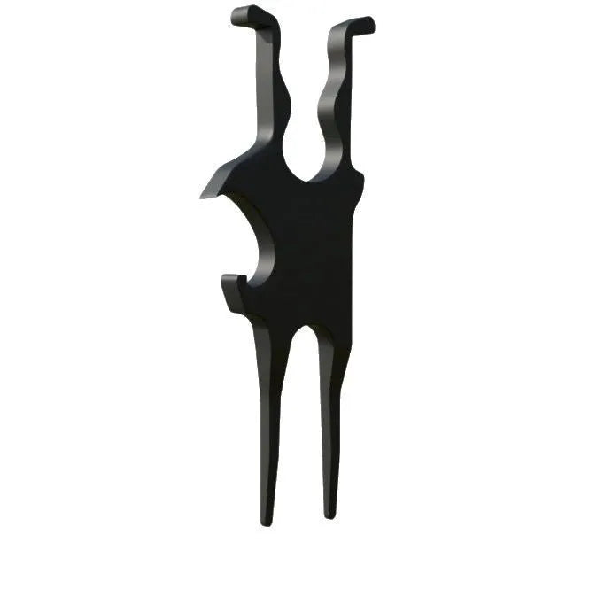 Black aluminium alloy golf turf repair tool 10.1 by 3.8 cm on grass