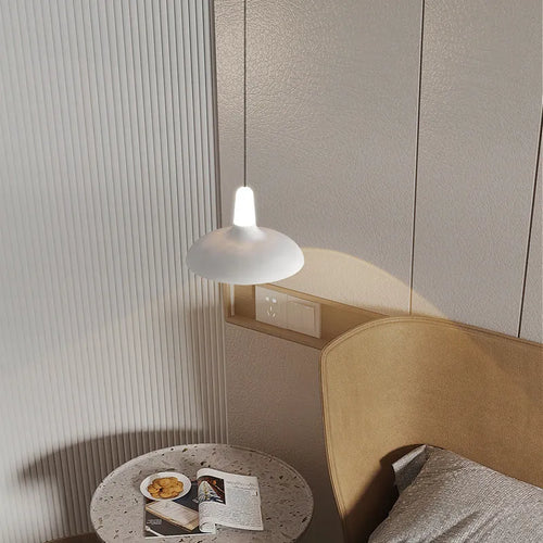 Adjustable Nordic style bedside pendant light in obsidian black finish with three colour temperature settings
