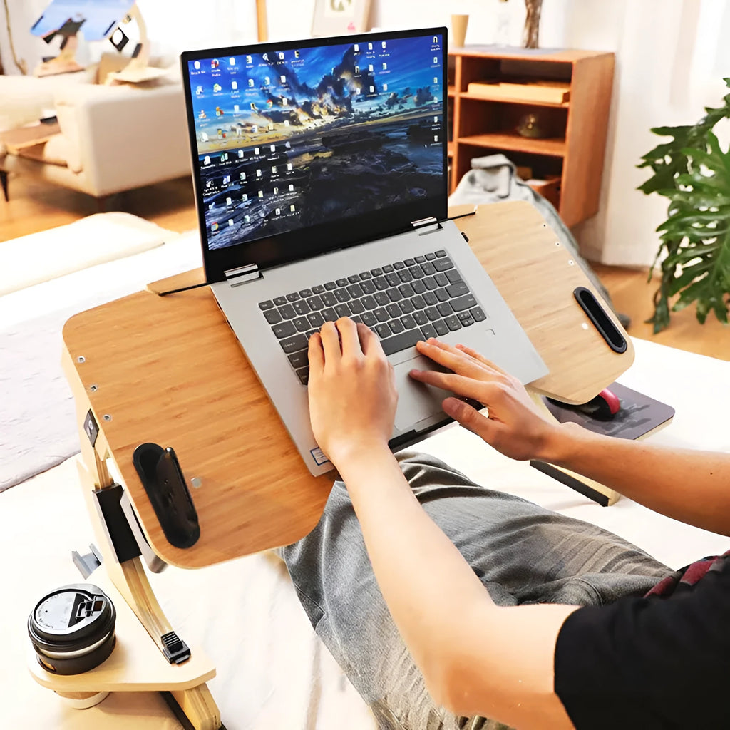 White maple wooden folding bed table with laptop, shown at an angle on a duvet.