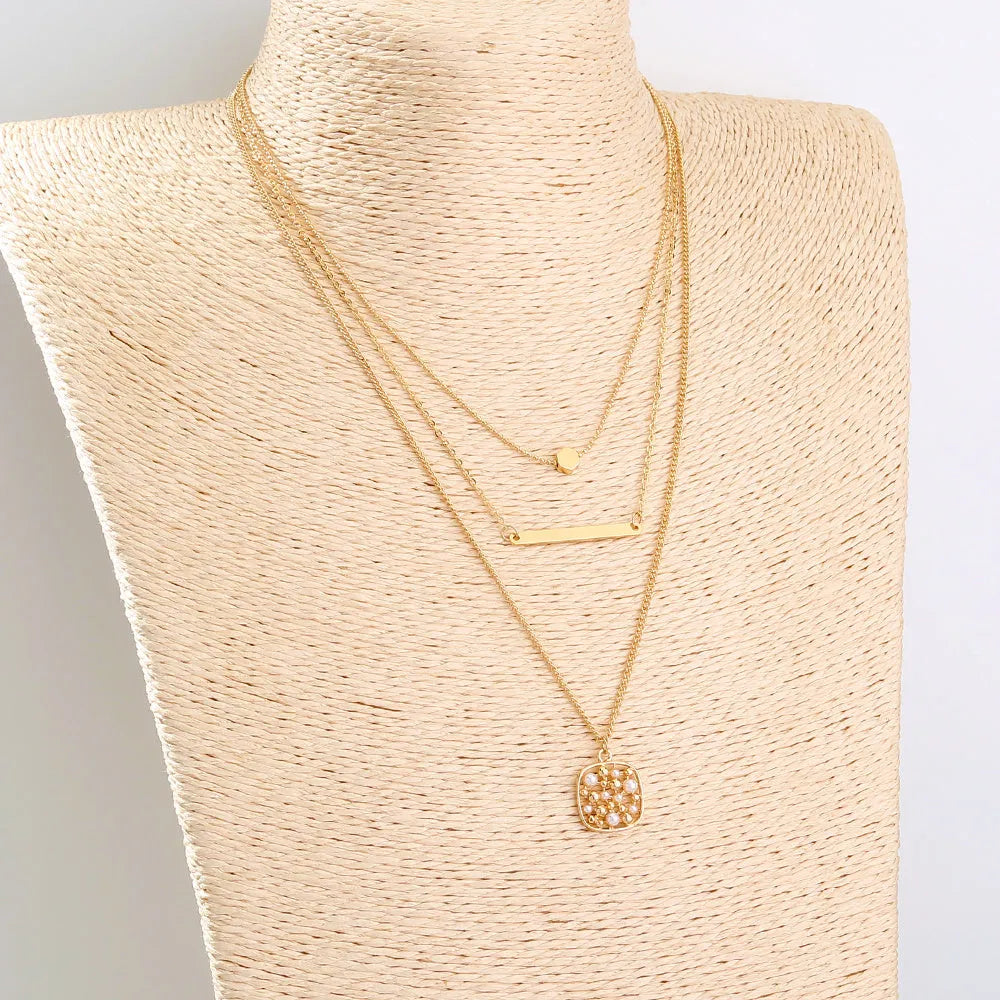 Multi-layer gold necklace with geometric pineapple pendant on adjustable chain, electroplated finish, zinc alloy