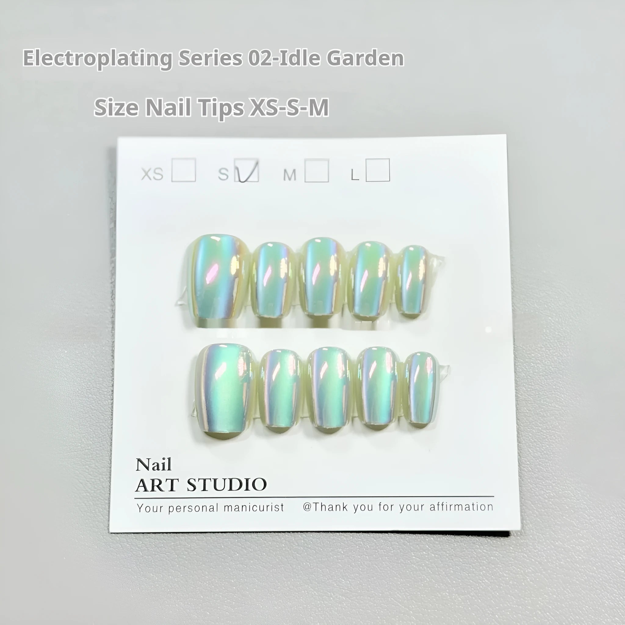 Electroplated cat's eye and aurora nail wraps for short ladder XS, S, and M nail sizes.