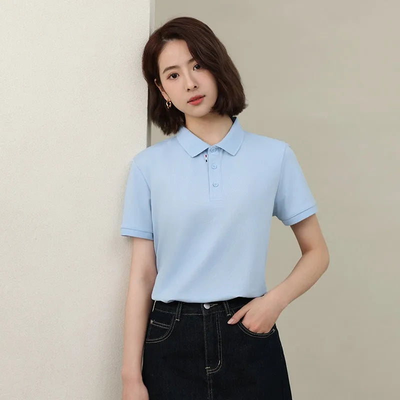 Solid colour ice silk catering work polo shirt on a hanger, shown in a light blue shade with short sleeves.