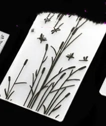 Plastic cake decorating mould showing windmill and flower shapes, folding size 14.5 by 10.5 cm.