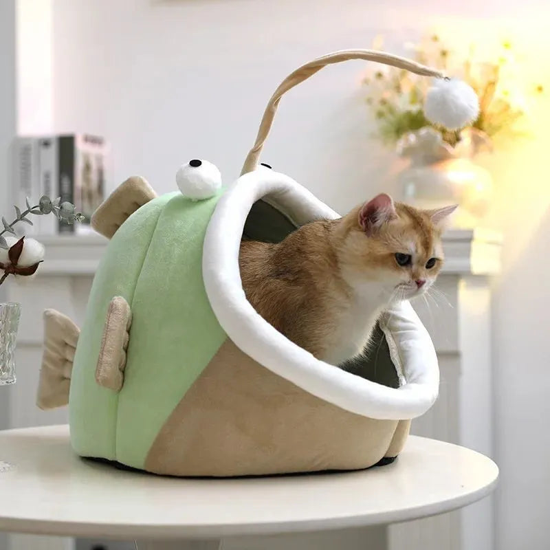 Grey semi-closed lantern fish shaped cat bed made of soft deerskin velvet, showing front opening.