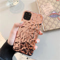 Electroplated rose gold TPU phone case for iPhone, showing precise camera and port cutouts.