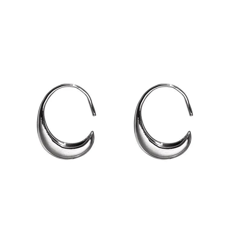 Teardrop hoop earrings in gold or silver tone alloy with C-shaped geometric design, one pair