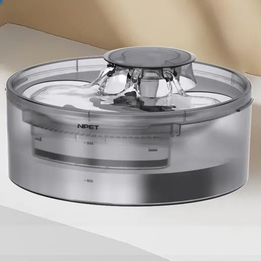 Automatic circulating water dispenser for dogs and cats with filter cartridge.
