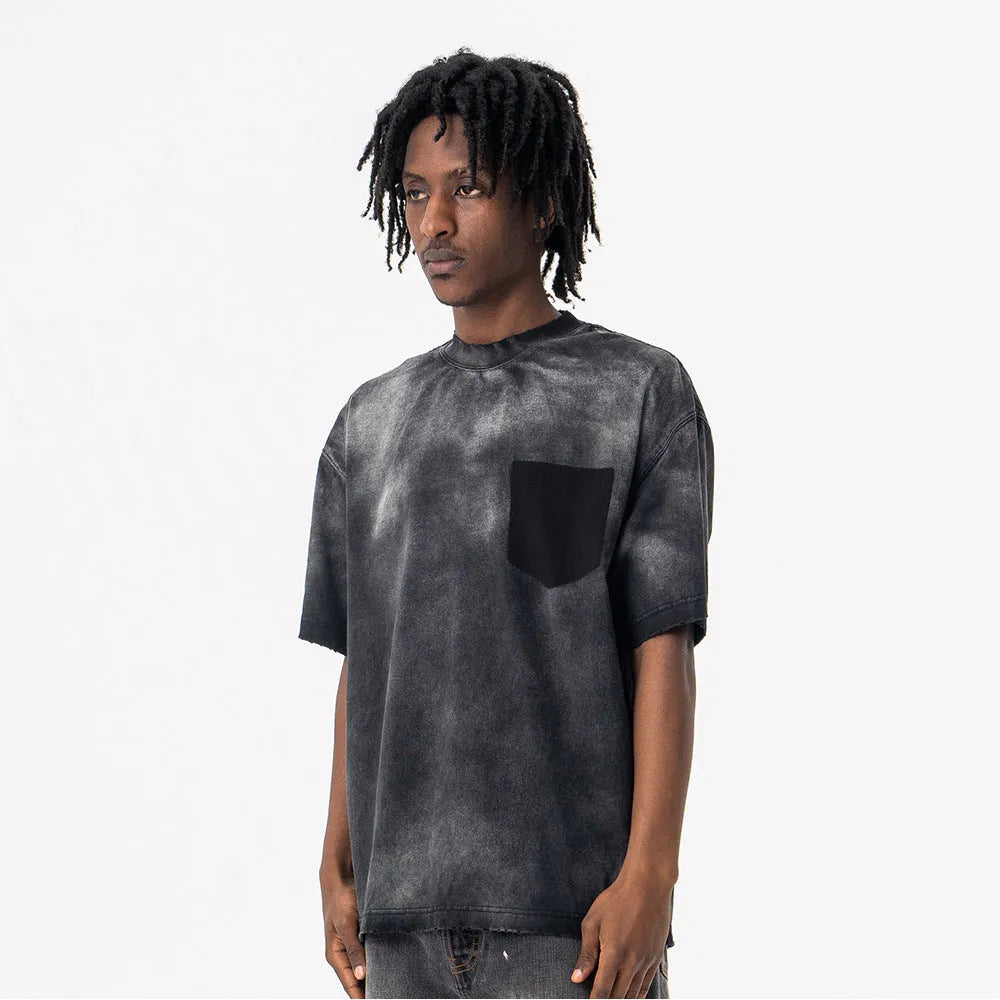 Men's black loose fit cotton t-shirt with drop-shoulder sleeves and white letter pattern print.